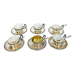 814  -  SEIS TAZAS CON PLATO Y CUCHARAS DE PLATA AÑOS 30