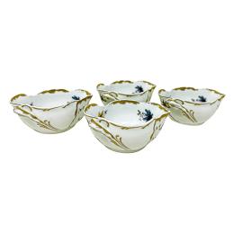 488 - CUATRO ESPECIEROS EN PORCELANA DEL ÚLITMO CUARTO DEL S.XX