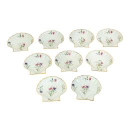 519 - NUEVE RECIPIENTES PARA ENTRANTES EN PORCELANA DE LIMOGES
