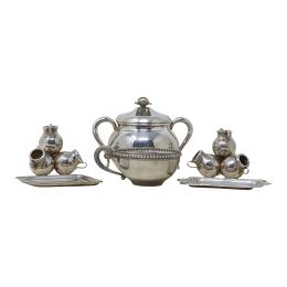 873 - CONJUNTO DE PIEZAS EN PLATA DE MEDIADOS S.XX