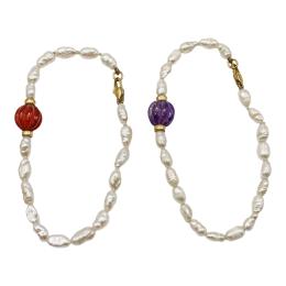 270 - TRES PULSERAS DE PERLAS DE RIO
