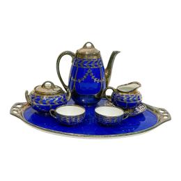 727 - JUEGO DE CAFÉ DE PORCELANA ALEMANA PRIMER TERCIO S. XX 