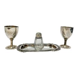 1001 - CONJUNTO DE PIEZAS EN PLATA DE MEDIADOS DEL S.XX