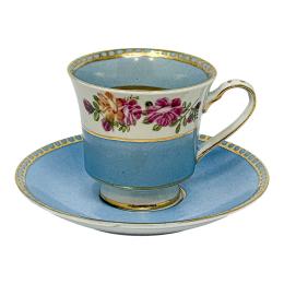 562 - TAZA CON PLATO DE PORCELANA FRANCESA DE MEDIADOS S. XX