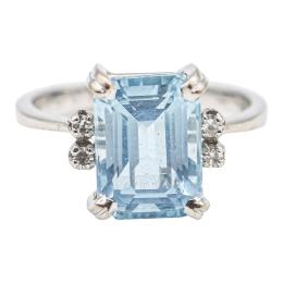 125 - ANILLO CON TOPACIO AZUL Y BRILLANTES