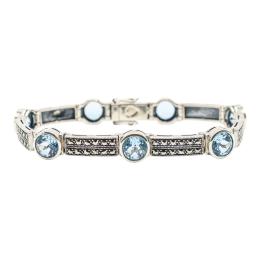 253 - PULSERA CON TOPACIOS AZULES Y MARQUESITAS