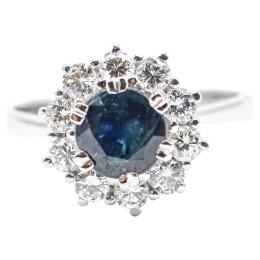 61 - ANILLO ROSETÓN CON ZAFIRO Y BRILLANTES