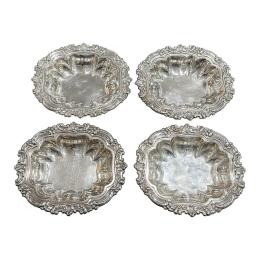 820 - CUATRO CENTRITOS DE MESA EN PLATA DEL ÚLTIMO CUARTO DEL S.XX