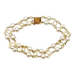 269 - PULSERA CON PERLAS DE LOS AÑOS 70