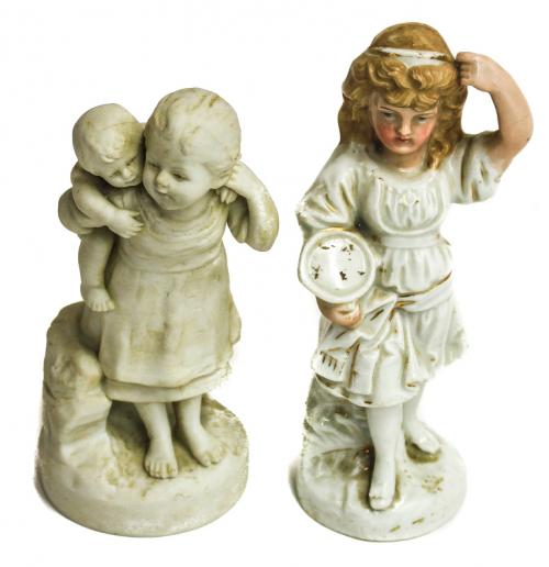 DOS FIGURAS EN BISCUIT Y PORCELANA
