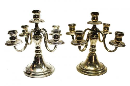 PAREJA DE CANDELABROS EN PLATA. PRIMER TERCIO DEL SIGLO XX