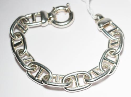 PULSERA DE PLATA CON CALABROTES