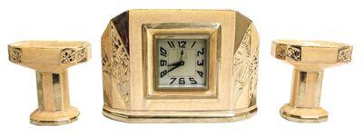 RELOJ CON GUARNICIÓN ART DECÓ