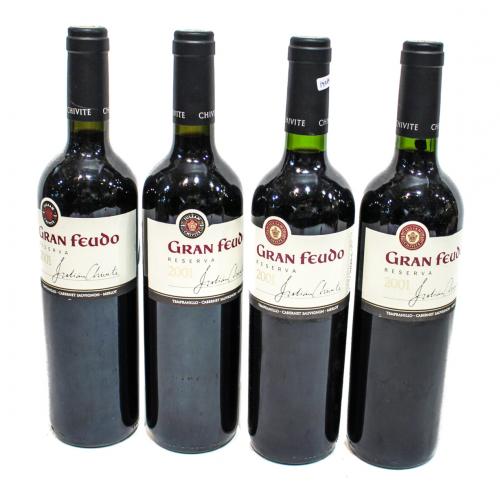 CUATRO BOTELLAS DE VINO