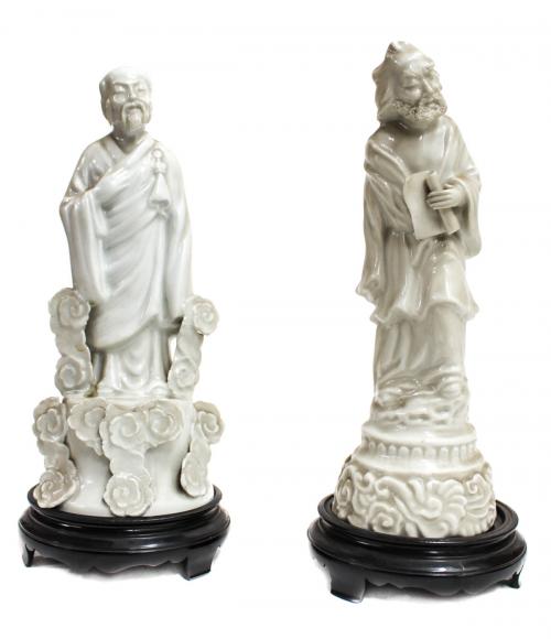 DOS FIGURAS ORIENTALES EN PORCELANA BLANCA