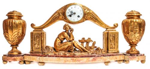RELOJ CON GUARNICIÓN ART DECÓ
