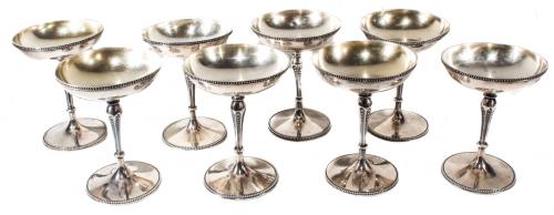 CONJUNTO DE OCHO COPAS  EN PLATA