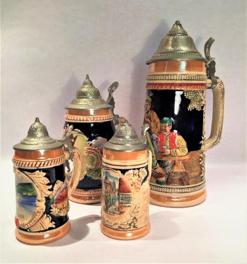 LOTE DE CUATRO JARRAS DE CERVEZA