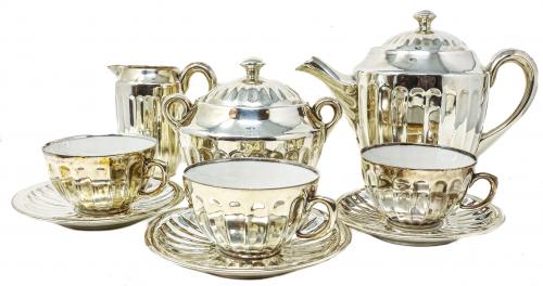 JUEGO DE TÉ EN PORCELANA PARA 11 SERVICIOS PRIMER TERCIO SXX