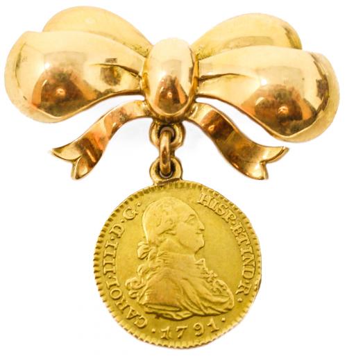 BROCHE CON MONEDA DE LOS AÑOS 40