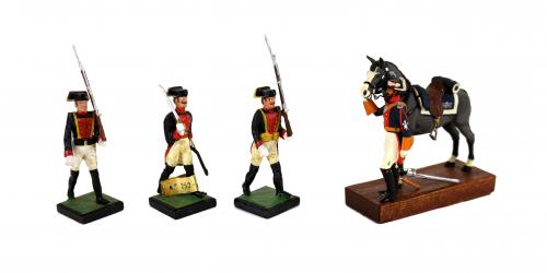 CUATRO FIGURITAS DE PLOMO "GUARDIACIVILES"