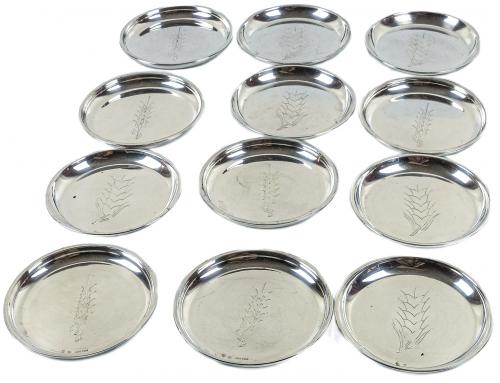 CONJUNTO DE 12 PLATITOS EN PLATA MEDIADOS S.XX