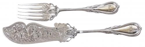 DOS CUBIERTOS DE SERVICIO EN METAL DE PRINCIPIOS S. XX