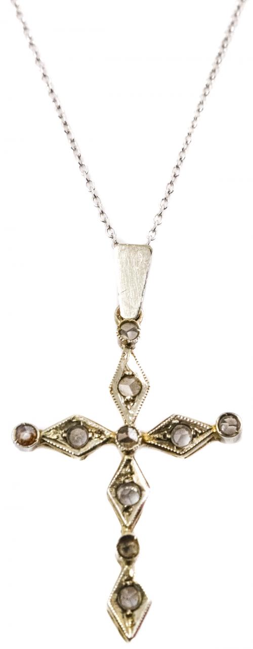 CRUZ COLGANTE CON BRILLANTES