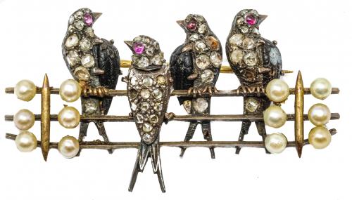 BROCHE CON GOLONDRINAS DE FLES. DEL S.XIX