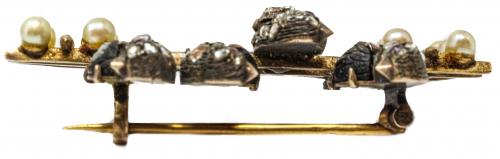 BROCHE CON GOLONDRINAS DE FLES. DEL S.XIX