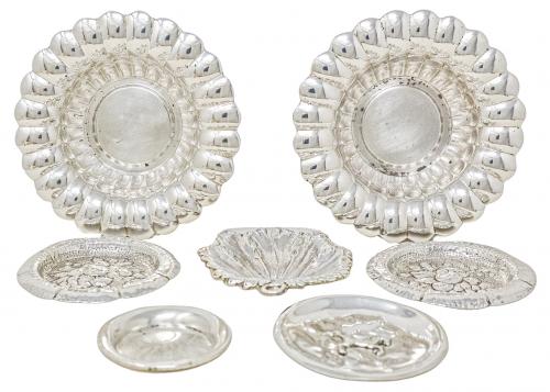 COLECCIÓN DE SIETE CENTRITOS DE PLATA