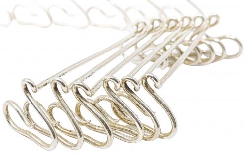 CONJUNTO DE 12 REPOSA CUBIERTOS EN PLATA