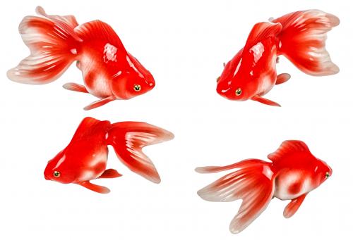 CUATRO PECES DE PORCELANA JAPONESA