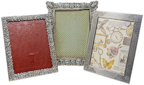 TRES MARCOS DE PLATA VARIADOS