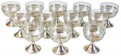 DOCE COPAS DE CHAMPAN EN PLATA Y CRISTAL