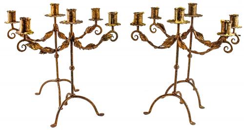 CUATRO CANDELABROS EN HIERRO
