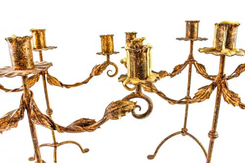 CUATRO CANDELABROS EN HIERRO
