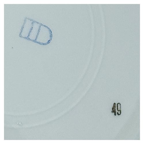 TRES PLATOS DE PORCELANA DE MEDIADOS DEL SIGLO XX