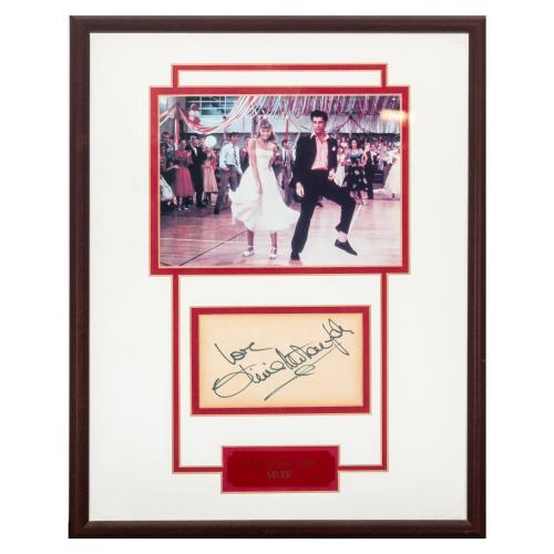 FIRMA OLIVIA NEWTON JONES