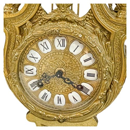 RELOJ CON GUARNICIÓN DEL ÚLTIMO CUARTO DEL S.XX