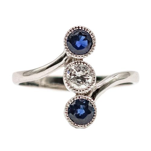 ANILLO CON BRILLANTE Y ZAFIROS