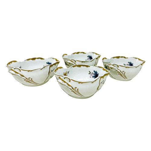CUATRO ESPECIEROS EN PORCELANA DEL ÚLITMO CUARTO DEL S.XX
