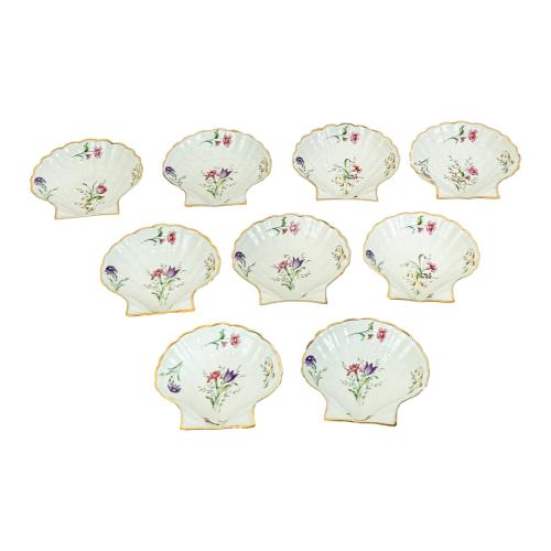 NUEVE RECIPIENTES PARA ENTRANTES EN PORCELANA DE LIMOGES