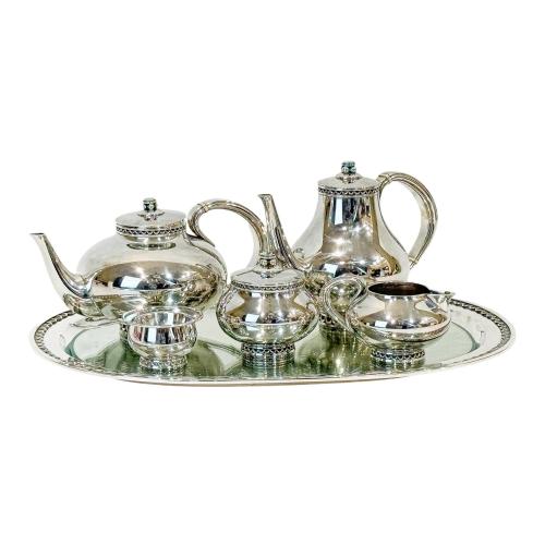 JUEGO DE CAFÉ Y TÉ EN PLATA DE MEDIADOS DEL SIGLO XX