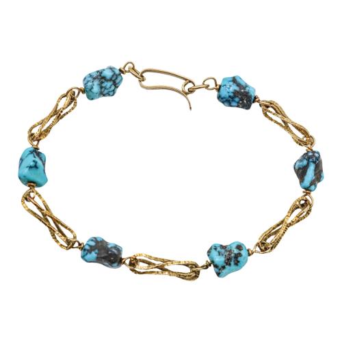 PULSERA CON HOWOLITA, AÑOS 60