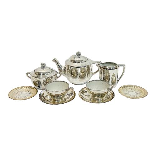 JUEGO DE TÉ EN PORCELANA PLATEADA