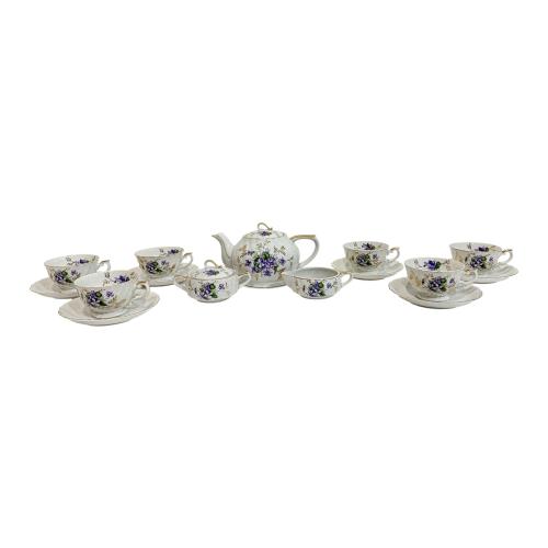 JUEGO DE TÉ EN PORCELANA DEL ÚLTIMO CUARTO DEL S.XX