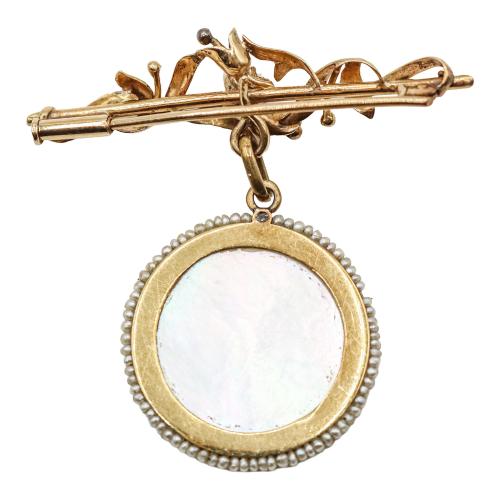 BROCHE ALFILER CON MEDALLA DE LOS AÑOS 40