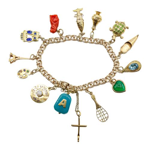 PULSERA CON COLGANTES DE LOS AÑOS 60