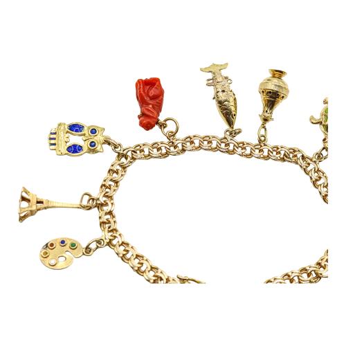 PULSERA CON COLGANTES DE LOS AÑOS 60